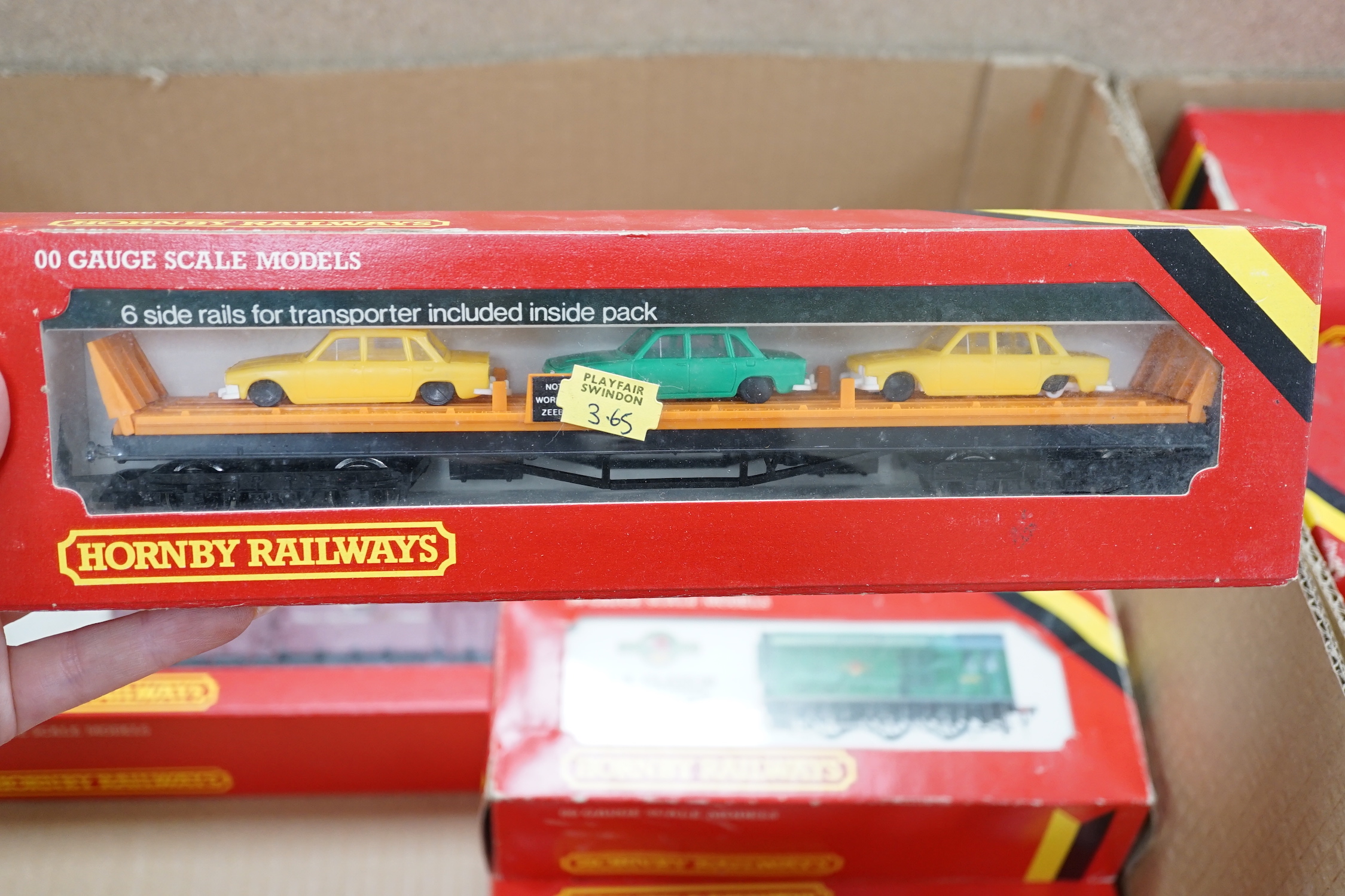 Thirty-six boxed Hornby railways 00 gauge items including five BR diesel locomotives; a Class 47 (R075), a Hymek (R074), a Class 25 (R068) and two Class 08 shunters (R156), together with fifteen freight wagons, twelve bo